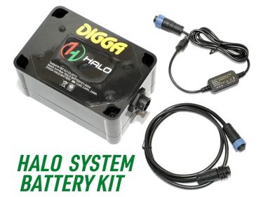A close-up of a Halo System Battery Kit, showing the battery pack, carrying handle, and label. The label displays the branding and specifications of the battery.